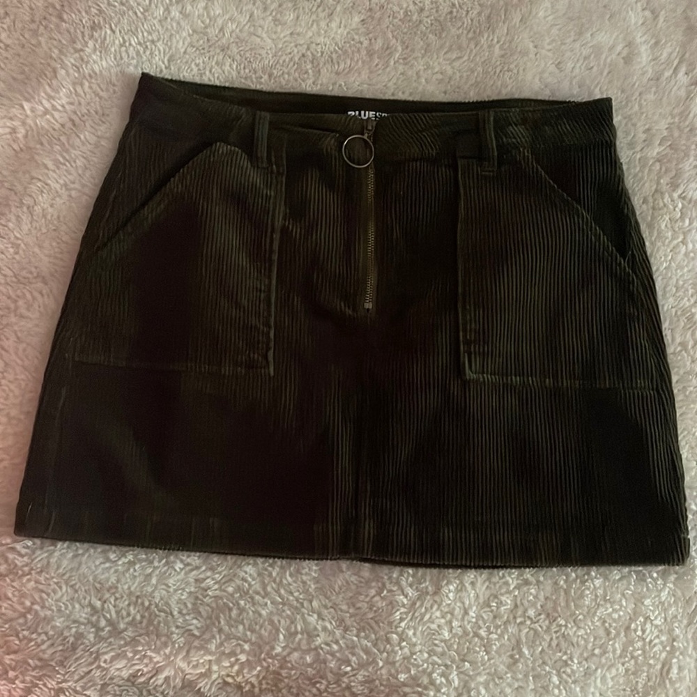 Dark green mini skirt